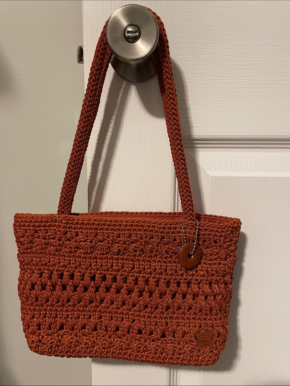 The Sak Rust Crochet Bag